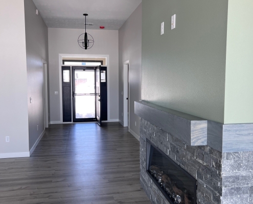 Custom Interior Accent Wall 6801 S Laguna Rosewood Homes Sioux Falls Custom interior with sage green accent wall and finishing details in a recently completed Rosewood Homes build at 6801 S Laguna Sioux Falls