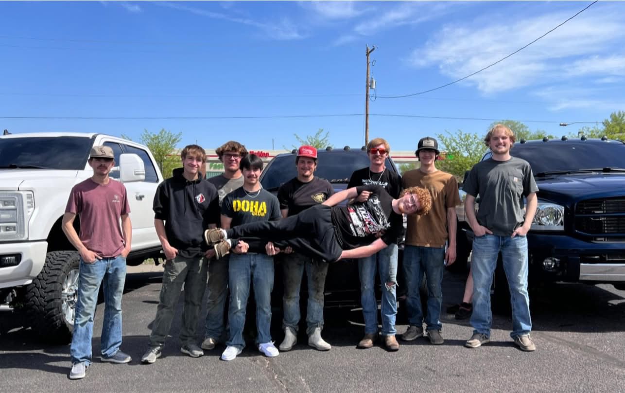 Wyatt and his friends celebrating at the Rosewood Homes Car and Vendor Showcase in Sioux Falls